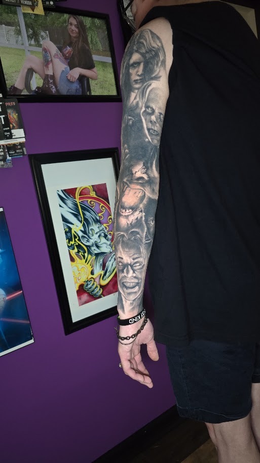 Back view of a black and grey classic horror sleeve by Billy Smith