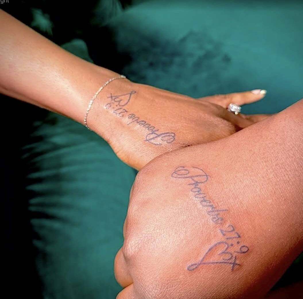 Matching memorial script hand tattoos by Cherae